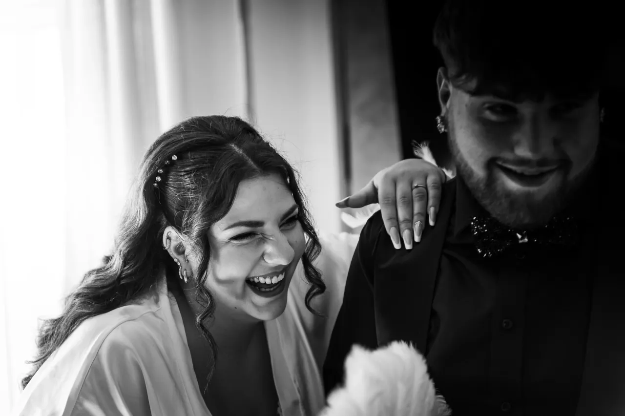 Laughter during preparations, in black and white